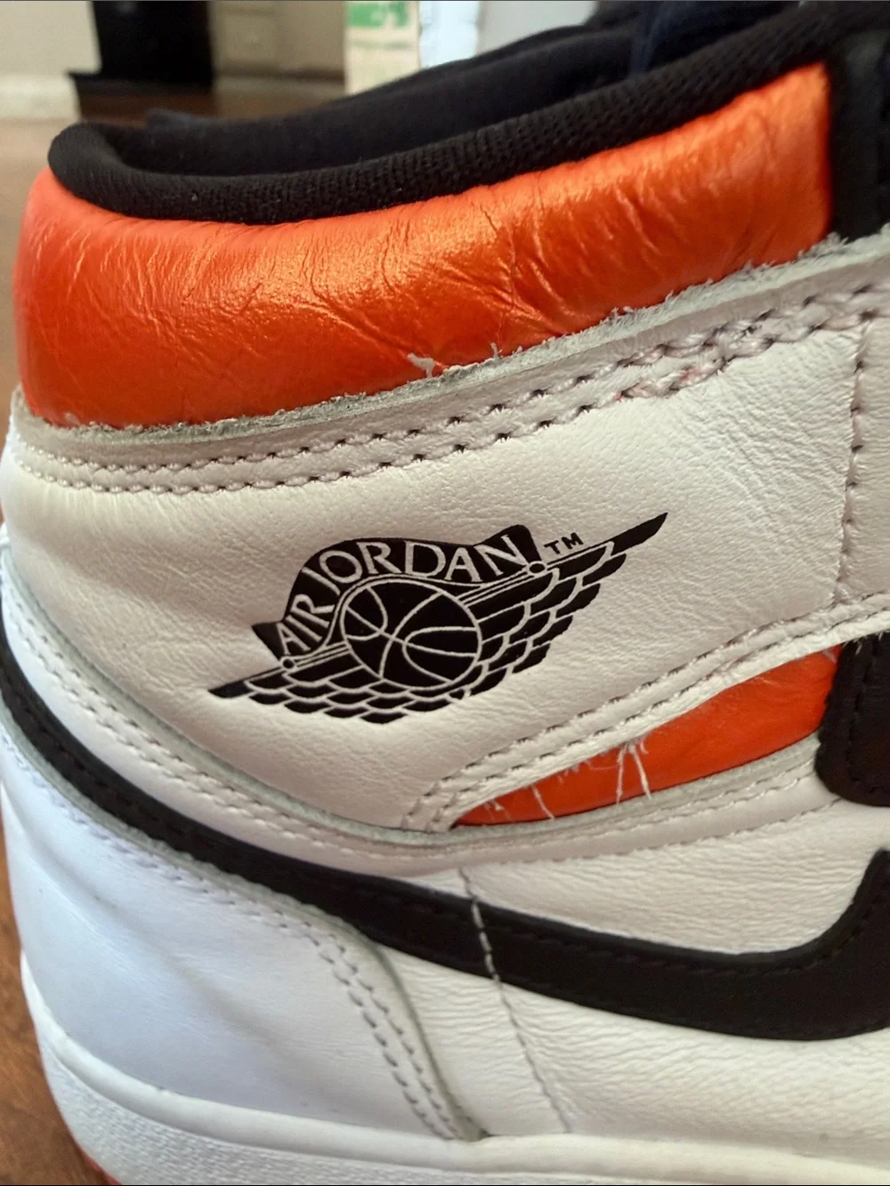 Nike High-Top Sneakers in Black, White & Orange Accents
